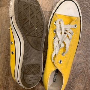 Yellow converse low tops